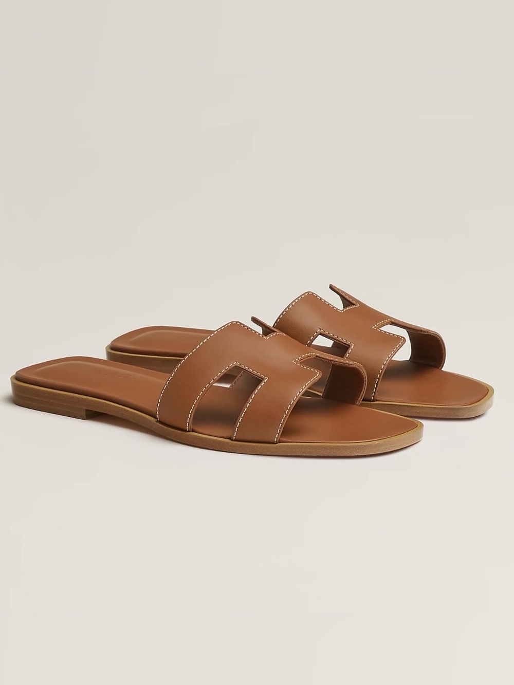Hermes Women’s Oran Calfskin Sandals In Gold